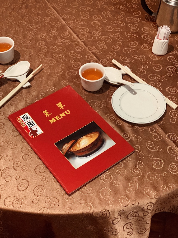 Red menus and golden tablecloths